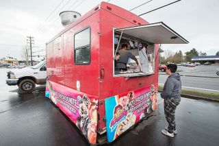Marcus Larson/News-Register##
Mac Daddy Donut food cart is located in the Staples parking lot.  Soon the business will move to its new location on Third Street.