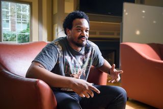 Rusty Rae/News-Register##Ray Crain, Linfield University Black Student Union president, reflects on programs for Black History Month. “Racism is still with us,” he said. “I want people to see us like us, not like a color.”