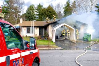 Photos courtesy Tualatin Valley Fire & Rescue##A Pinehurst Drive home in Newberg was heavily damaged by a fire Tuesday.