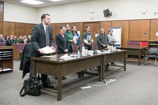 Rusty Rae / News-Register##Attorney Steve Cox and estate representative Grace Snidow appear in court along with Hendricks Road residents Brian Suverly, Jack Pettit, Patrick O Rourke, Wayne Gross and Marshall Gross.