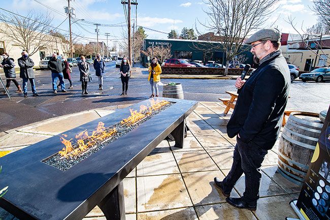 Marcus Larson/News-Register ## John Mead, founder of Vesuvian Forge, demos a new product, the Pompei Fire Table. Made of special low-carbon-emission concrete, the table can be used for outdoor dining at restaurants, homes and wineries.