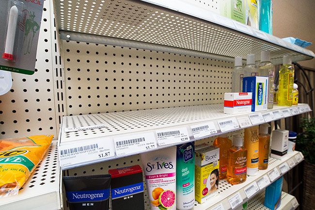 Marcus Larson/News-Register##
At Mac Prescription Shop, soap and hand sanitizer shelves were empty Monday. Many McMinnville stores sold out over the weekend.