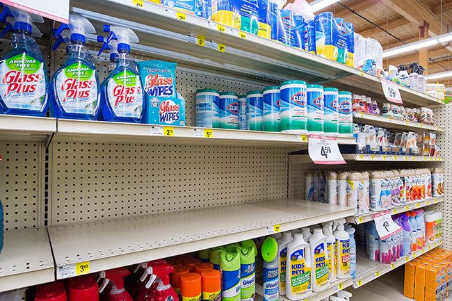 Marcus Larson/News-Register##
Bi-Mart shelves were mostly empty of sanitation wipes Monday, but a new supply of Clorox wipes had just been delivered (center right).