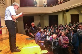 Kirby Neumann-Rea/News-Register ## Laureate lecture attendees lined up to ask Dr. William Phillips questions in his talk at Melrose Hall at Linfield University. First in line was Ellis Miller, 7, of McMinnville, there with his mother, Amber.