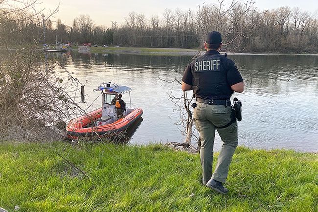 Submitted photo##Rescuers search Wednesday for a vehicle that went into the Willamette River near the Wheatland Ferry. The search resumed Thursday morning.