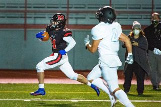 Tigard High School's one-of-a-kind pink football uniforms fight