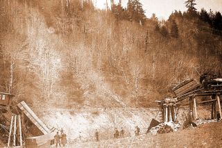 Image: Salem Public Library##The aftermath of a train wreck on the Oregon Pacific Railroad line during the 1880s, when T. Edgenton Hogg was running the line.