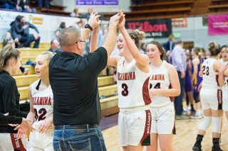 Marcus Larson/News-Register##
Willamina head coach Tom Anderson high fives Kallie Schoenbachler (3) after their team’s consolation semifinal win against Harrisburg. Marcus Larson/News-Register##
Willamina head coach Tom Anderson high fives Kallie Schoenbachler (3) after their team’s consolation semifinal win against Harrisburg.
