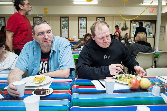 Marcus Larson/News-Register ##
Neal Gettman and Jessie Harker enjoy quiche and companionship at the soup kitchen.