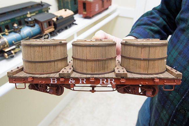 Marcus Larson/News-Register ## Jim Dunk’s model of an early 1900s packing car for transporting produce.