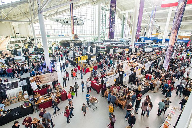 News-Register file photo##
Crowds fill the Evergreen Space Museum at a past McMinnville Wine & Food Classic. The event would have celebrated its 27th year this weekend, but was canceled due to concerns about the spread of coronavirus.