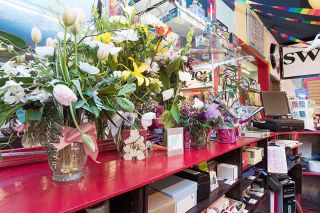 Marcus Larson / News-Register##Flowers at Hopscotch, the toy store where Forness worked.
