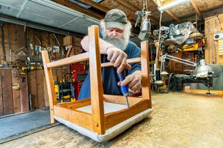 Marcus Larson News-Register ## Gary Musselman started learning his trade as a young teen when he visited his grandfather at Buck’s Upholstery. “He let me make stuff,” Gary said. William “Buck” Musselman started the McMinnville shop 75 years ago.