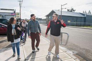 Rusty Rae/News-Register##Lafayette Assistant City Administrator Kevin Perkins, right, discusses the city’s issues with Rep. Andrea Salinas, left. Perkins, City Administrator Branden Dross and Mayor Hilary Malcomson took Salinas on a walking tour of the downtown area Tuesday.
