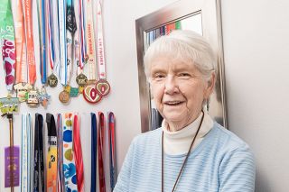 Rusty Rae/News-Register ## Although it’s been less than a decade since she started walking for exercise, Ruth Mendes da Costa has collected dozens of medals for finishing 5K, 10K and half-marathon events. Rusty Rae/News-Register ## Although it’s been less than a decade since she started walking for exercise, Ruth Mendes da Costa has collected dozens of medals for finishing 5K, 10K and half-marathon events.
