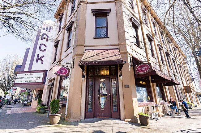 Marcus Larson/News-Register ## The historic Yamhill Hotel, built in 1886 on the corner of what is now Third and Evans streets, is for sale along with the Mack Theater and the Macy Building, which houses retail shops along Evans and Second streets.