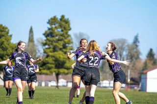 Submitted Photo/J. Barnes##There were plenty of celebrations on Saturday during the Valley Panthers victory, as they cruised to a 78-7 win over Canby. Here, from left to right, Britta Strickland, Merary Ulloa-Uribe, Eva Lemons and Madison Marrs celebrate after Lemons scored a try off a pass from Marrs.