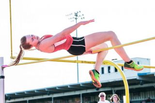 Marcus Larson/News-Register##
Grizzly high jumper Hallie Johnson barely clips the bar during an attempt in Tuesday’s league opener against Newbrerg. Johnson won the event with a final clearance of five feet and also claimed victory in the long jump. Marcus Larson/News-Register##
Grizzly high jumper Hallie Johnson barely clips the bar during an attempt in Tuesday’s league opener against Newbrerg. Johnson won the event with a final clearance of five feet and also claimed victory in the long jump.