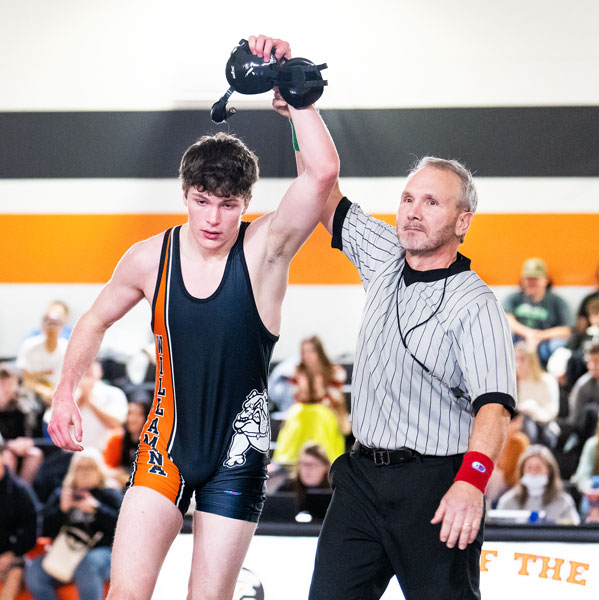 Dayton s Tony Cisneros earns a win at the 3A District tournament. He went on to a 28-0 season and second state title at the 145-pound weight class.