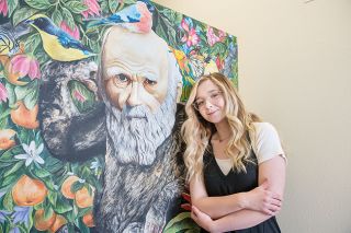 Rusty Rae/News-Register ## McMinnville High School senior Keelie Grasley, pictured here with her painting, “Charles Darwin’s Theory of Evolution.” Rusty Rae/News-Register ## McMinnville High School senior Keelie Grasley, pictured here with her painting, “Charles Darwin’s Theory of Evolution.”