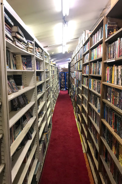 Kirby Neumann-Rea/News-Register##To quote Ernest Hemingway, the 63-year-old Jim’s Trading Post in Grand Ronde is a clean, well-lighted place, with orderly stacks of books, and a somewhat jumbled array of hardware, clothing and varied second-hand goods.
