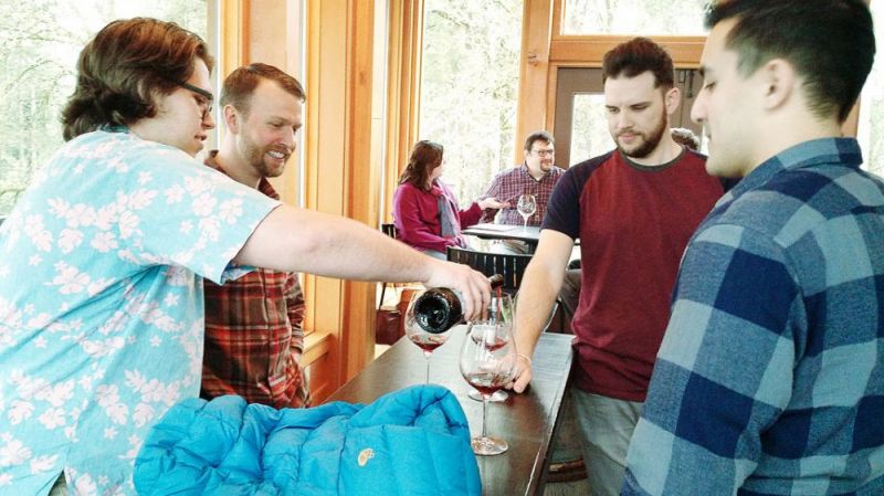 Ossie Bladine/News-Register##Young wine drinkers enjoying a tasting flight at Vista Hills Vineyard in the Dundee Hills.