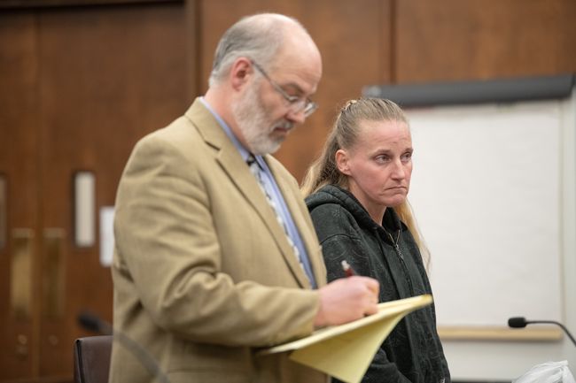 Rusty Rae/News-Register##Amber Rocco flanked by her attorney, Mark Lawrence of McMinnville, in Yamhill County Circuit Court Tuesday morning.