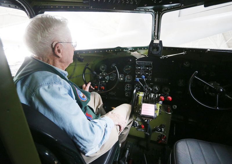 Rockne Roll/News-Register## Evergreen docent Dick Wood sits in the cockpit of a Douglas DC-3, the same DC-3 Wood worked on as a mechanic with United Airlines. One of his fellow docents, the late Jack Schlemer, piloted the same plane.