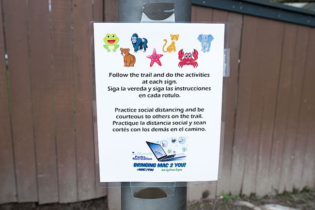 Marcus Larson / News-Register##Signs posted lalong the greenway trail in West McMinnville encourage youngsters to run in place, do jumping jacks and otherwise act like animals.