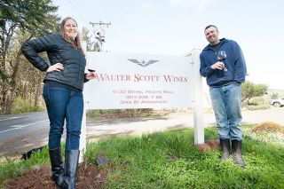 Marcus Larson/News-RegisterWalter Scott Wines co-owners Erica Landon and Ken Pahlow stand at the entrance to their new winery facility in the Eola Hills.
