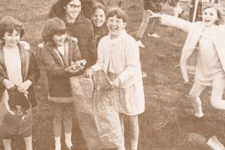 Adams Elementary School students do their part picking up litter around McMinnville on the first Earth Day, April 22, 1970.