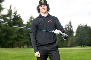 Rusty Rae/News-Register##
Portland Junior Winterhawks player Luc Navari decided to join the McMinnville golf team this spring, and has experienced quick success on the course. Pictured at Michelbook Country Club during Wednesday’s practice session, Navari and the Grizzlies host a Pacific Conference tournament next Monday.