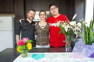 Rusty Rae/News-Register ## Christian Ramirez loves living in the new Habitat home with his parents, Gerardo Ramirez Lopez and Maria Guadalupe Leon Lamus. Their kitchen is filled with flowers presented for his mother’s birthday, which was celebrated at the same time they moved in. Rusty Rae/News-Register ## Christian Ramirez loves living in the new Habitat home with his parents, Gerardo Ramirez Lopez and Maria Guadalupe Leon Lamus. Their kitchen is filled with flowers presented for his mother’s birthday, which was celebrated at the same time they moved in.