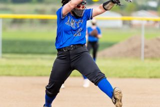 Marcus Larson/News-Register##
Amity freshman pitcher McKenzie Turley prepares to fire a fastball to a Regis hitter during Monday’s non-conference game, which the Warriors won, 18-2.