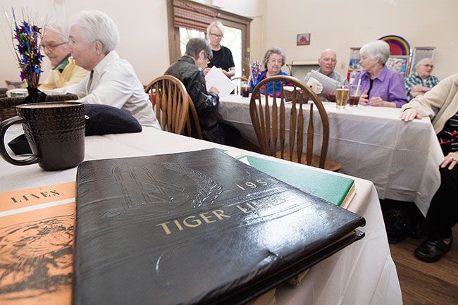 Marcus Larson/News-Register##Yearbook for the Yamhill-Carlton High School class of 1953, on display at the graduates 65th reunion party earlier this year.