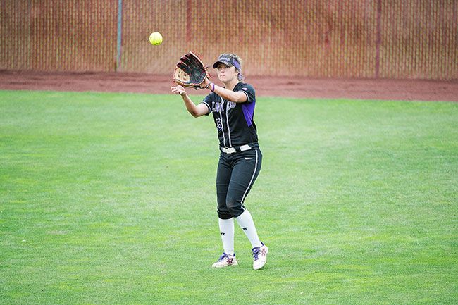 Marcus Larson/News-Register file photo##
Linfield outfielder Kelsey Wilkinson catches a line drive during last season’s DIII Super Regional. Wilkinson, along with Kamryn Apling, will both use the NCAA’s offer of extra eligibility to return next year.