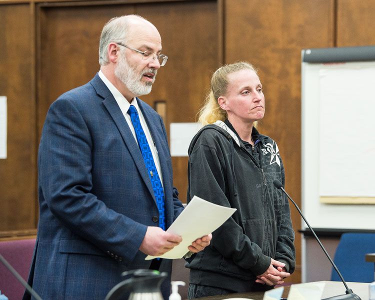 Marcus Larson/News-Register##Amber Rocco, accompanied by McMinnville attorney Mark Lawrence, at her plea and sentencing hearing Tuesday afternoon in Yamhill County Circuit Court.