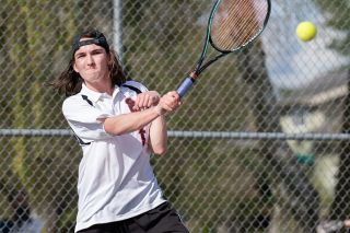 Marcus Larson/News-Register file photo##
McMinnville varsity tennis player Quincy Reuter, pictured during the team’s match against Liberty last month, competed in singles and doubles last week against Liberty, Glencoe, Tualatin and Sprague. Marcus Larson/News-Register file photo##
McMinnville varsity tennis player Quincy Reuter, pictured during the team’s match against Liberty last month, competed in singles and doubles last week against Liberty, Glencoe, Tualatin and Sprague.