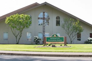 Marcus Larson/News-Register##A former parishoner claims in a lawsuit the pastors of Abundant Life Pentecostal Church slandered him.
