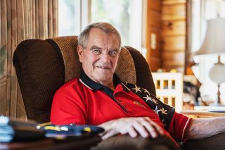 Rachel Thompson/News-Register##Stan Varuska, a native of Carlton, relaxes at home near Gaston. A veteran, he continues his activities with the Carlton Memorial Post of the American Legion – including making sure flags are posted on patriotic holidays.