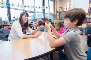 Marcus Larson/News-Register ##
Memorial Elementary kindergarten teacher Molly Bousquet works with Peter Curtin and other students who are dissecting owl pellets during class. Marcus Larson/News-Register ##
Memorial Elementary kindergarten teacher Molly Bousquet works with Peter Curtin and other students who are dissecting owl pellets during class.