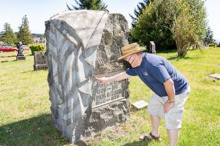 Marcus Larson/News-Register ## McMinnville Masonic Cemetery sexton Johnny Edwards marvels at the American flag carved on his favorite tombstone. Amazing how a carver can make stone appear to drape like fabric, he said.