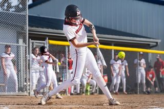 Marcus Larson/News-Register file photo##
McMinnville pitcher Mackenzie Bekfosky, pictured during the Grizzlies’ 12-2 win over Sunset April 7, has slugged two home runs in the past two games to lead Mac to its fifth and sixth straight wins. Marcus Larson/News-Register file photo##
McMinnville pitcher Mackenzie Bekfosky, pictured during the Grizzlies’ 12-2 win over Sunset April 7, has slugged two home runs in the past two games to lead Mac to its fifth and sixth straight wins.