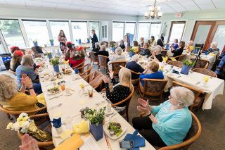 Marcus Larson/News-Register##McMinnville Soroptimists gathered to celebrate the service club’s 70th anniversary Tuesday applaud for Sara Goodman, this year’s recipient of the Live Your Dream grant. The club awards funds each year to women who’ve returned to school to better themselves.