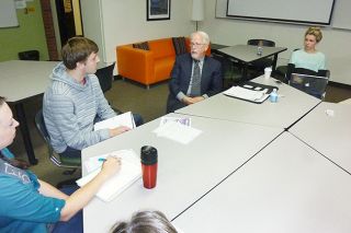 Starla Pointer / News-Register##Judge John Collins speaks with Linfield College students in the mass media and law program.
