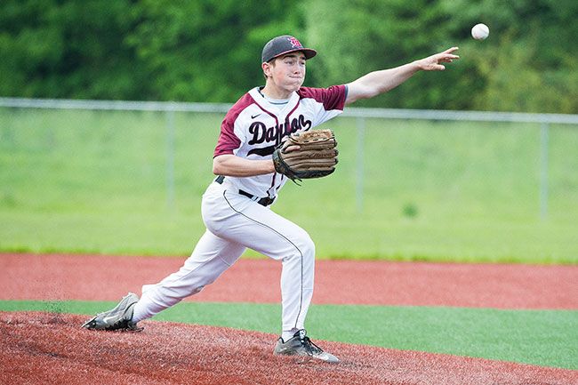Marcus Larson/News-Register##
Dayton starting pitcher Josiah Primbs  delivers a pitch to home plate in the Pirates tough extra inning 9-6  loss to Sisters.