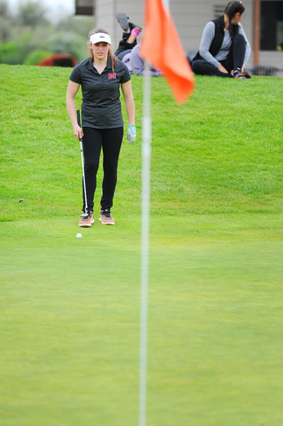Rusty Rae/News-Register##
McMinnville’s Frances Remmick lines up a putt on the 18th holes at Trysting Tree last Tuesday.