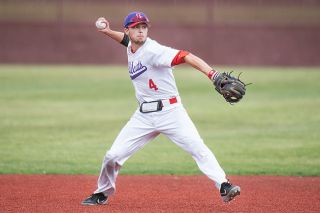 Rusty Rae/News-Register##
Linfield senior Tanner Jaques, who will likely return for a fifth year, guns down a runner at first base after fielding a grounder. during the weekend&rsquo;s action against Pacific Lutheran University