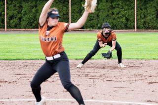 Marcus Larson/News-Register##
As Yamhill-Carlton starting pitcher Kati Slater delivers a strike, second baseman Lexiss Antle prepares to receive any ground ball which comes in her direction. The pair led the Tigers to Tuesday’s 14-0 win over Amity.