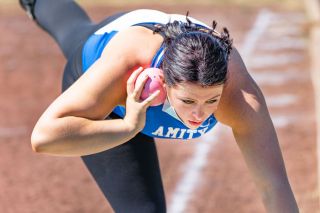 Marcus Larson/News-Register##
Amity’s Haley Vanderzanden prepares to launch the shot put during Wednesday’s 3A district
track and field meet.
Vanderzanden won the event
with a mark of 34’6.75”. Marcus Larson/News-Register##
Amity’s Haley Vanderzanden prepares to launch the shot put during Wednesday’s 3A district
track and field meet.
Vanderzanden won the event
with a mark of 34’6.75”.